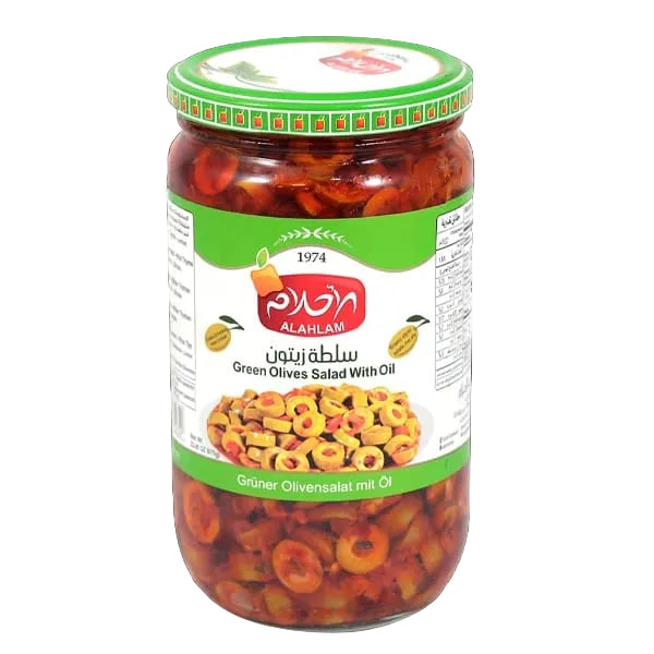 A glass jar of Alahlam Green Olives Salad with Oil, featuring a green and white label with the red Alahlam logo, set against a solid black background.